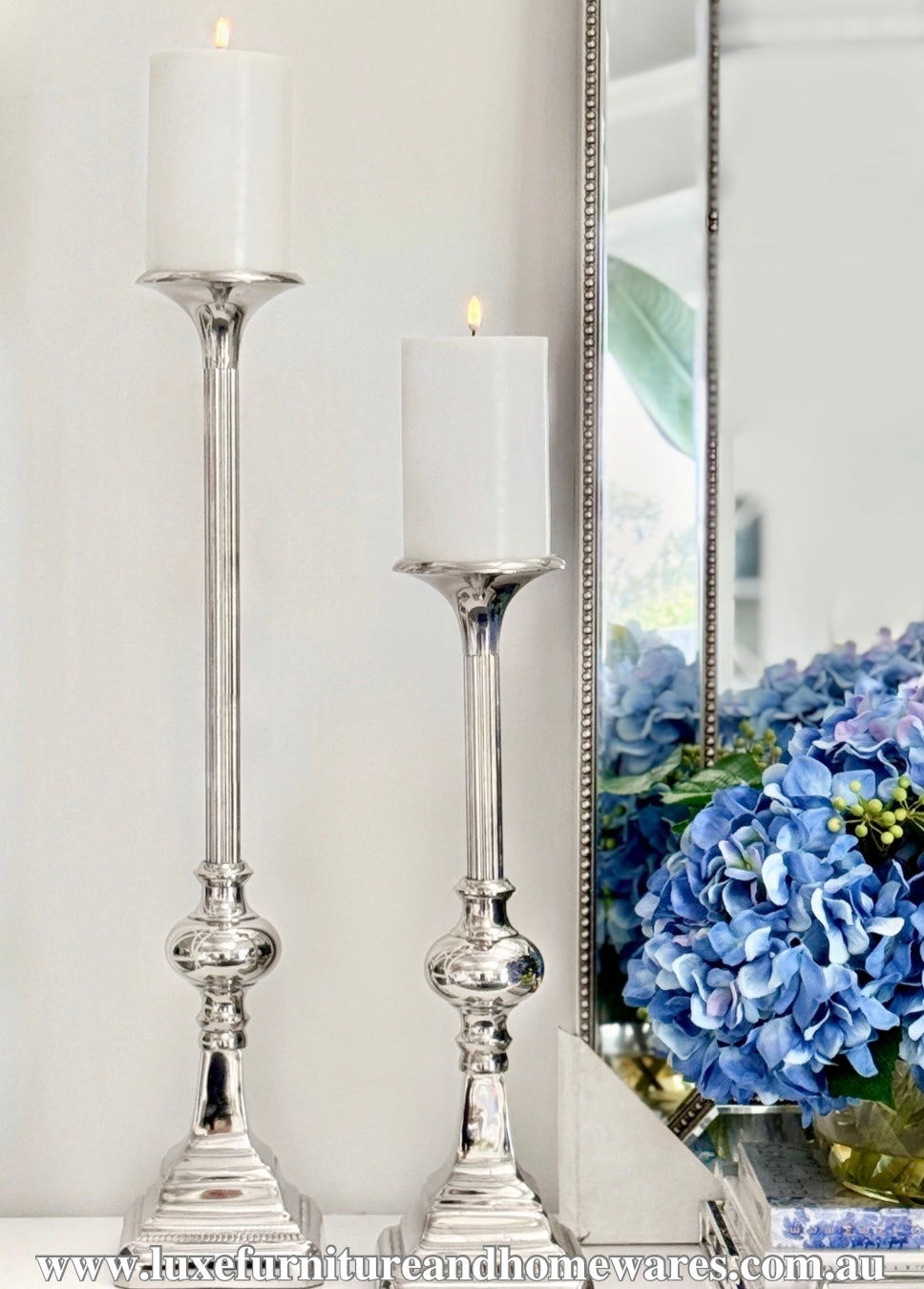 Pair Of Silver Fluted Candlesticks