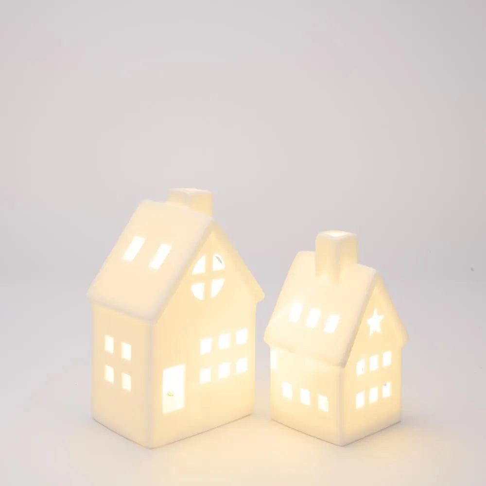 Pair of White Porcelain Light Up Houses