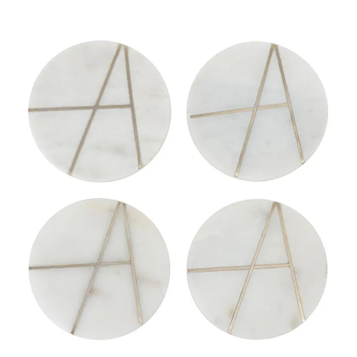 Set Of Four White Marble Coasters With Gold Inlay