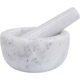 Marble mortar and pestle on a white background